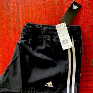 Adidas athletic shorts, size large. Never worn.